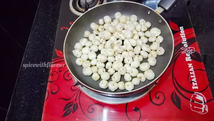 Clean the makhana thoroughly. Heat a pan and fry the makhana on low-medium heat until crunchy and golden brown, stirring frequently to prevent sticking.