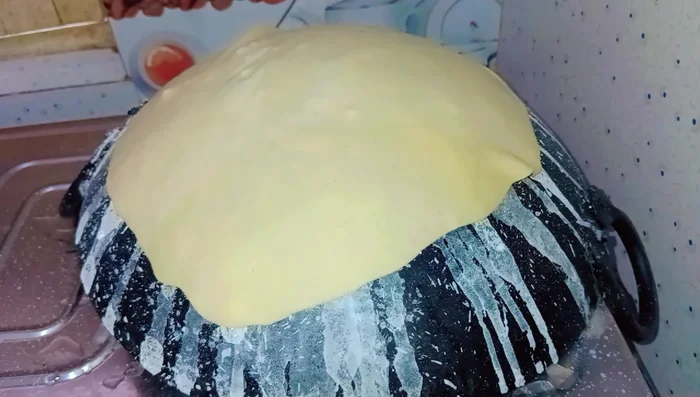 Carefully place the rolled roti onto the hot, seasoned skillet. Cook on high heat, flipping frequently, until lightly browned and cooked through. The cooking time is short.