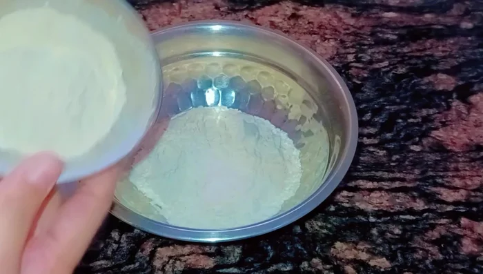 In a large bowl, combine flour (all-purpose or a mix of all-purpose and whole wheat for a healthier option), sugar, salt, and oil. Mix well.