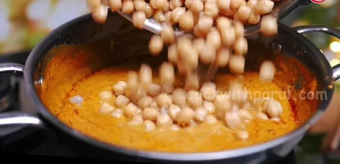 Add the boiled chickpeas. Simmer for 2 minutes.