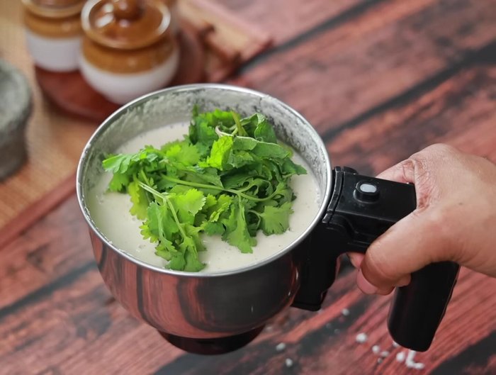 Add coriander and mint leaves; pulse gently to combine.
