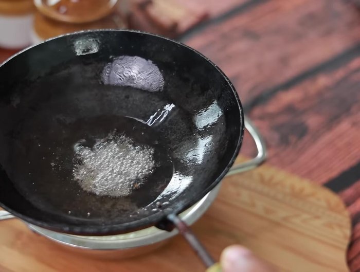 Heat oil in a pan. Add mustard seeds and cumin seeds; sauté until fragrant.