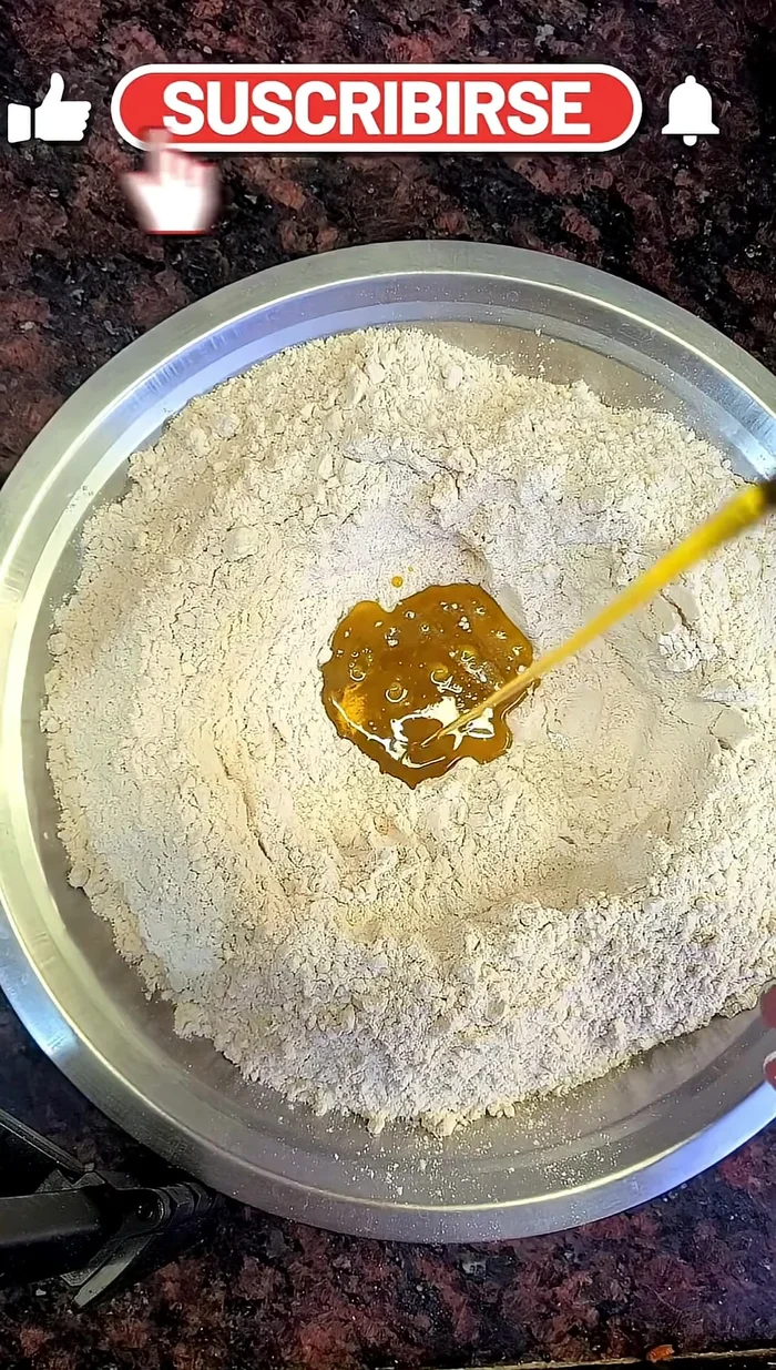 In a separate bowl, mix wheat flour with mustard oil (or ghee).