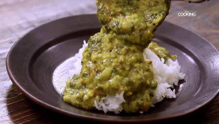 Serve hot with steamed rice and a drizzle of ghee (167.44).