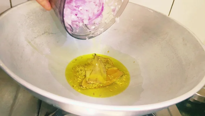 Add finely chopped onions and sauté well.