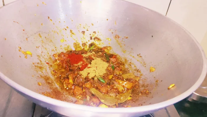 Cook the spices until fragrant and the oil starts to separate.