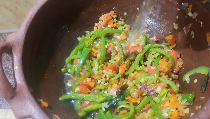 Add water (150g), cover, and cook until vegetables are tender.