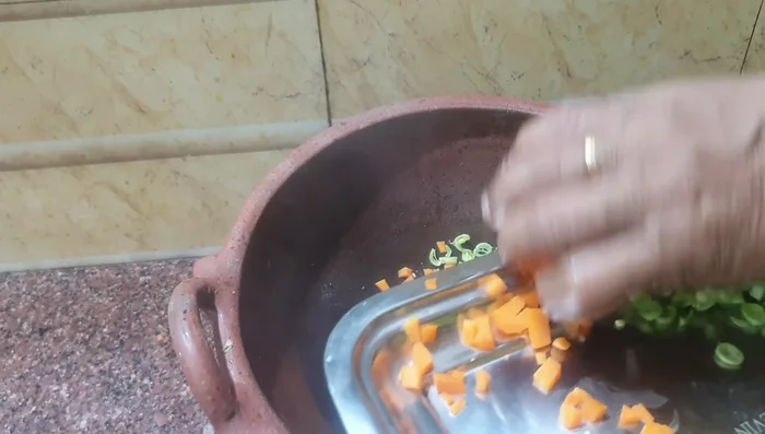 Add carrots and beans; cook until 80% done.