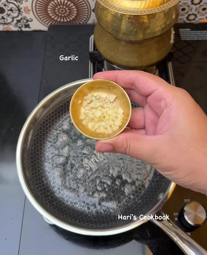 For herb rice: Heat butter, add garlic, dried chili flakes, coriander powder, and pepper powder. Fry until fragrant.