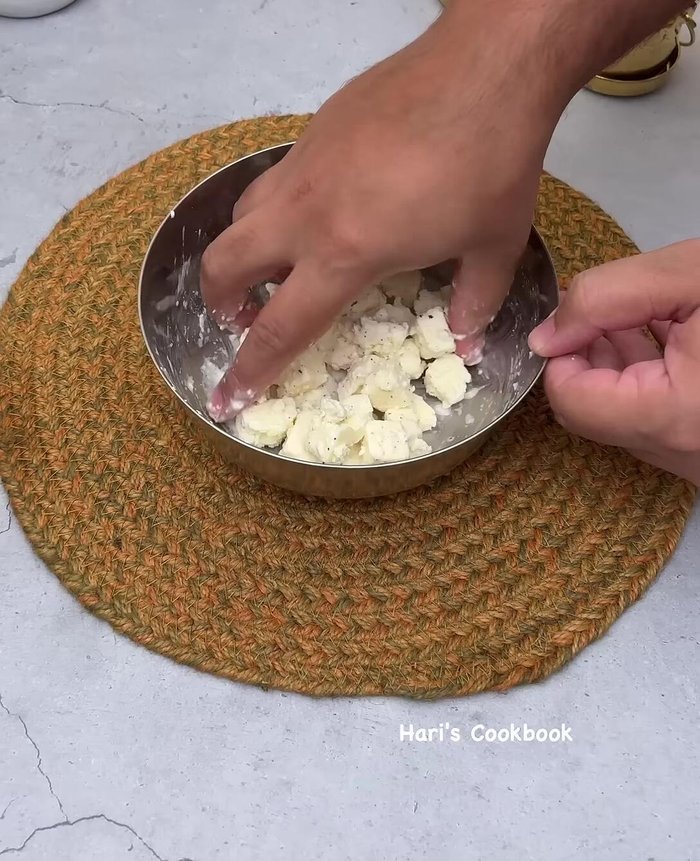 Marinate paneer with salt, pepper powder, cornstarch, water, and cheese.