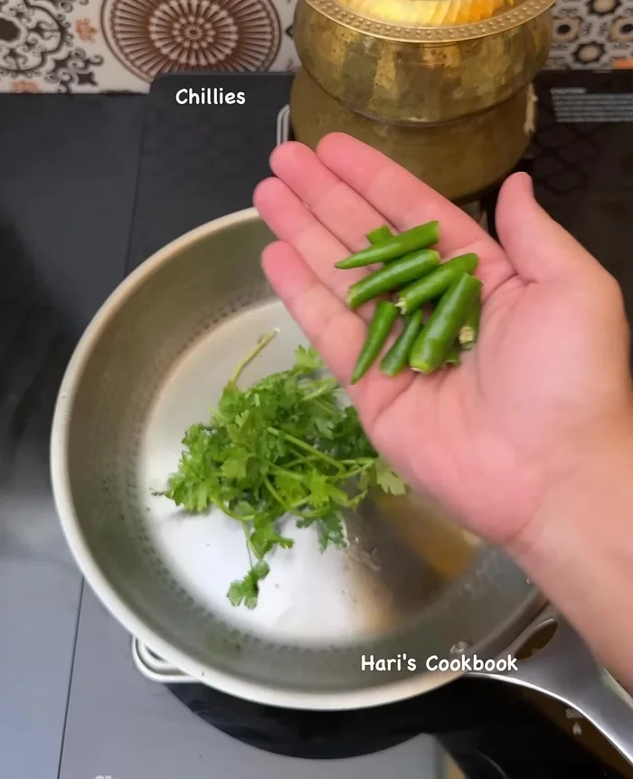 Fry coriander and green chilies until fragrant, set aside.