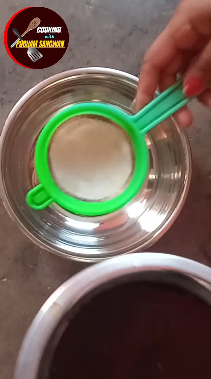 Filter the melted jaggery through a sieve.