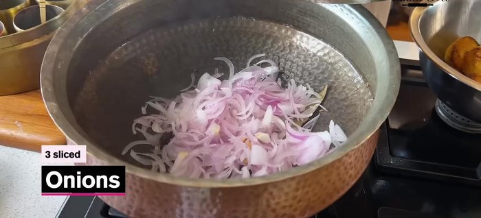 Add sliced onions and saute until golden brown and slightly fried. Add more oil if needed.