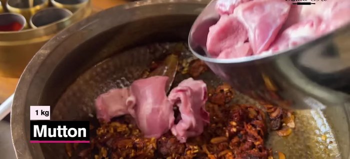Increase heat to high and add mutton. Sear the meat for 4-5 minutes.