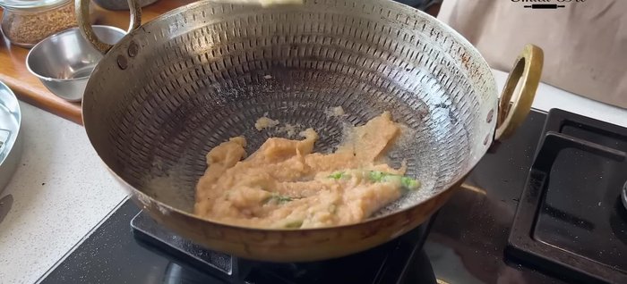 Add the pounded spices, salt, and saute until fragrant.