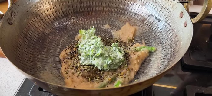 Lower heat to low and add the yogurt and turmeric powder. Saute until the oil separates.