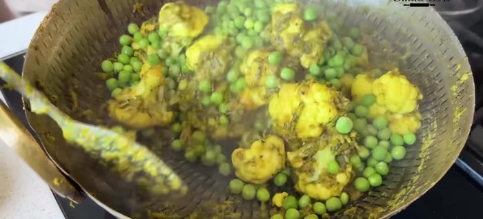 Add peas and salt. Cook until peas are done.