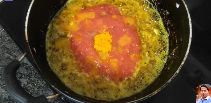 Add turmeric powder, chili powder, cumin powder, and coriander powder. Mix well.