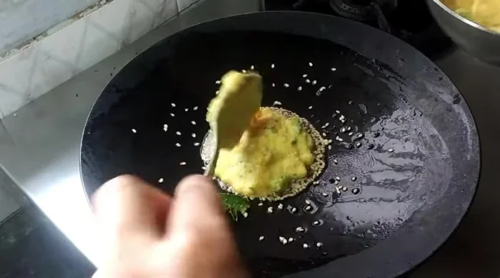 (Optional) For a vegetable version: Pour the vegetable batter onto the pan. Spread slightly. Cook on low flame, covering the pan. Flip once the top looks dry.