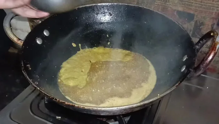 In the same pan, add the remaining masala paste. Sauté for a while.