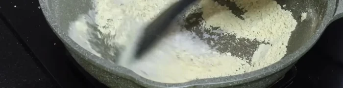Add the roasted coconut to the roasted peanut powder.