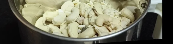 Grind 1 cup of nuts in a mixer. You can grind it finely or coarsely.