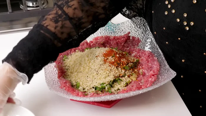 Add bread crumbs and mix well. You can substitute bread crumbs with finely chopped roti.
