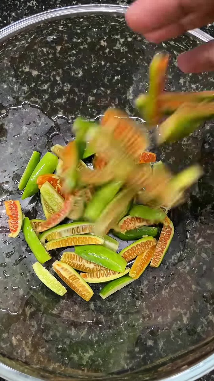 Add the Govakkai to the hot oil.
