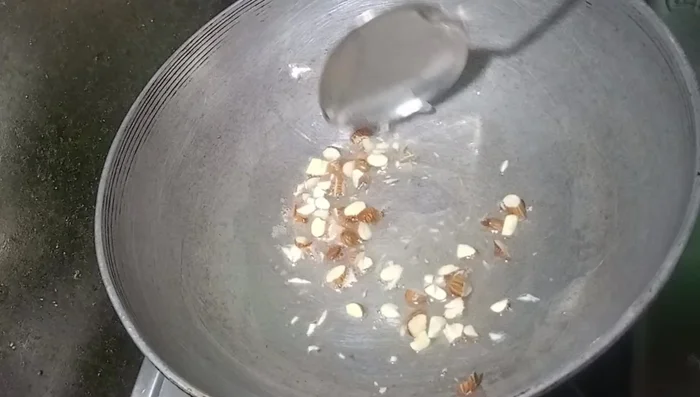Lightly roast the chopped dry fruits for 2-3 minutes and set aside.