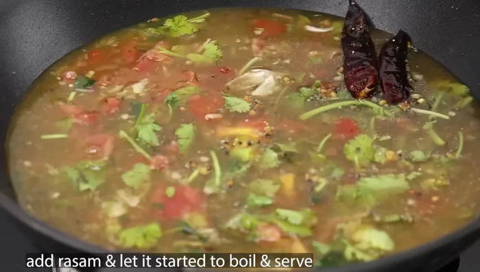 Add the prepared rasam mixture to the tempering and mix gently. Add a little water, adjust salt.