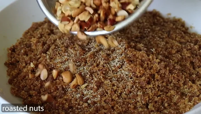 Add poppy seeds (optional), roasted and chopped cashews and almonds. Mix thoroughly.