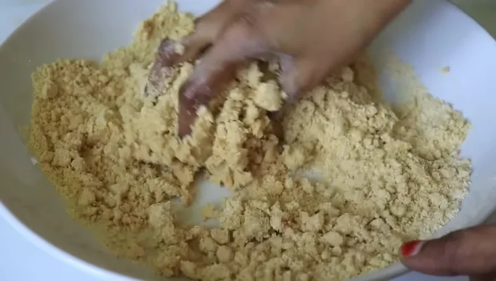 Add water gradually and knead into a smooth dough. Avoid using hot water.